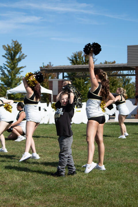 Little Boy with Dance Team